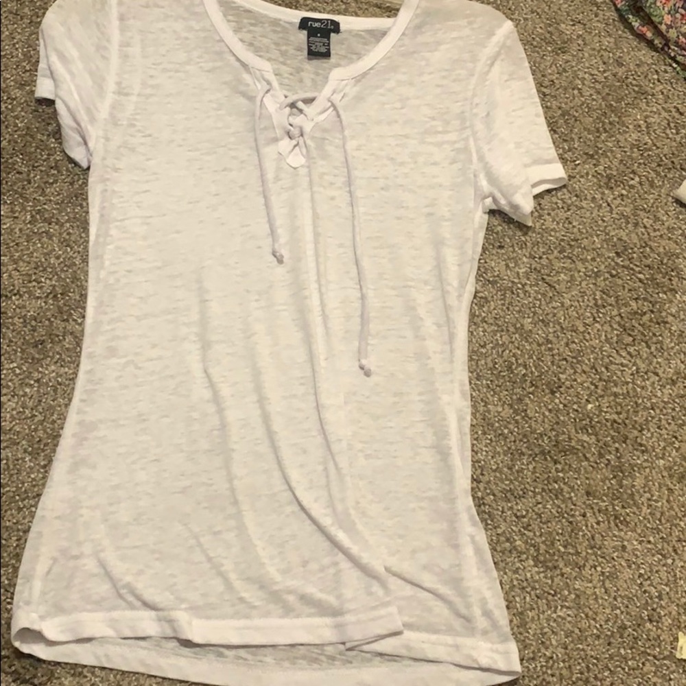 White shirt with tie up on top